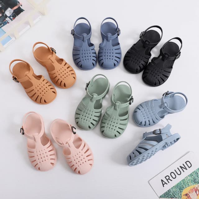 Kinder Baotou Sandalen Frühling und Sommer Jungen und Mädchen weichen Boden Hohlloch Schuhe flache Gelee Schuhe Baby Schritt Schuhe